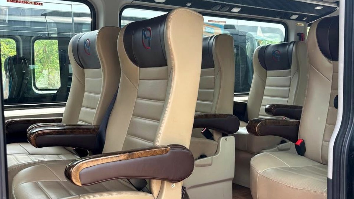 Comfortable tempo traveller interior for family and corporate group rental in Delhi NCR